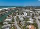 Breathtaking aerial view of coastal homes along a street ending near a waterfront with ocean views at 322 S Washington Dr, Sarasota, FL 34236