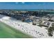 Aerial view of a vibrant beach community with stunning ocean views, lively beaches, and nearby accommodations at 322 S Washington Dr, Sarasota, FL 34236