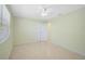 Neutral bedroom with a ceiling fan, and large window for natural light at 322 S Washington Dr, Sarasota, FL 34236