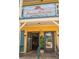 Tommy Bahama Restaurant and Bar entrance with outdoor decor and an inviting view of the interior at 322 S Washington Dr, Sarasota, FL 34236