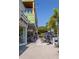 Charming retail district with shops, restaurants, outdoor seating, and sidewalk foot traffic at 322 S Washington Dr, Sarasota, FL 34236