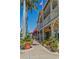 Kilwins storefront with outdoor seating and lush planters along the sidewalk at 322 S Washington Dr, Sarasota, FL 34236