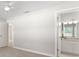 This bedroom boasts neutral walls and carpet along with an en-suite bathroom featuring stylish vanity and lighting at 3413 5Th W Dr, Palmetto, FL 34221