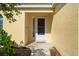 Entrance featuring a screen door and well maintained landscaping at 3413 5Th W Dr, Palmetto, FL 34221