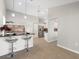 Spacious kitchen with an island, seating and stainless appliances at 3413 5Th W Dr, Palmetto, FL 34221