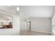 Open concept living room with pass through view into the kitchen with tile floor at 3413 5Th W Dr, Palmetto, FL 34221