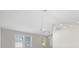 Living room with vaulted ceilings, fan and natural light at 3413 5Th W Dr, Palmetto, FL 34221