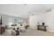 Bright living room featuring neutral colors, a fan, and plenty of space for furniture at 3413 5Th W Dr, Palmetto, FL 34221