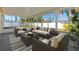 This is a furnished sunroom with lots of windows and light at 3413 5Th W Dr, Palmetto, FL 34221