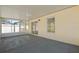 A sunroom with multiple windows and a ceiling fan at 3413 5Th W Dr, Palmetto, FL 34221