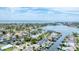 Coastal community featuring waterfront homes, private docks, and a scenic view of the open water at 3941 14Th Ne Ln, St Petersburg, FL 33703
