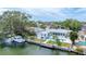 Expansive aerial view of the waterfront property, highlighting the home's prime location with pool and boat dock at 3941 14Th Ne Ln, St Petersburg, FL 33703