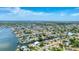Expansive aerial view of a waterfront community featuring beautiful homes and navigable canals on a clear, sunny day at 3941 14Th Ne Ln, St Petersburg, FL 33703