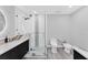 Bathroom featuring a glass walk-in shower and modern fixtures including a bidet at 3941 14Th Ne Ln, St Petersburg, FL 33703