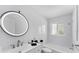 Bathroom featuring a tub/shower combo, modern fixtures and decor at 3941 14Th Ne Ln, St Petersburg, FL 33703