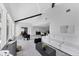 Spacious open-concept living area with soaring ceilings and sleek, modern finishes at 3941 14Th Ne Ln, St Petersburg, FL 33703