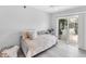 Cozy space features a couch, sliding glass doors, and light wood flooring at 3941 14Th Ne Ln, St Petersburg, FL 33703