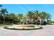 Beautiful fountain and manicured landscaping welcome you to this exquisite community at 4104 Las Palmas Way, Sarasota, FL 34238