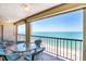 Inviting balcony with comfortable seating and stunning ocean views, perfect for relaxing and entertaining at 4401 Gulf Of Mexico Dr # 907, Longboat Key, FL 34228