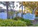 Inviting community entrance featuring lush landscaping, signage, and well-maintained grounds at 4401 Gulf Of Mexico Dr # 907, Longboat Key, FL 34228