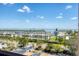 Scenic view of a well-maintained community with lush landscaping, waterfront access, and tropical foliage at 4401 Gulf Of Mexico Dr # 907, Longboat Key, FL 34228