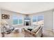 Bright living room boasts amazing ocean views, comfortable seating, and decorative accents at 4401 Gulf Of Mexico Dr # 907, Longboat Key, FL 34228
