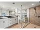 Luxurious bathroom with dual sinks, a glass shower, and stylish fixtures at 4600 Gulf Of Mexico Dr # 201, Longboat Key, FL 34228