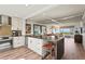 Modern kitchen with stainless appliances, island, and beautiful views of the water at 4600 Gulf Of Mexico Dr # 201, Longboat Key, FL 34228