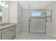 Bright bathroom featuring a frameless glass shower and luxurious fixtures, creating a spa-like experience at 4881 Antrim Dr, Sarasota, FL 34240