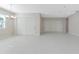 Bright living room with white tile flooring and modern light fixture at 4881 Antrim Dr, Sarasota, FL 34240