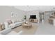 Bright living room with neutral tones, stylish furnishings, and modern decor create a welcoming and comfortable atmosphere at 4881 Antrim Dr, Sarasota, FL 34240