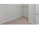 Empty walk-in closet with wire shelving, ready to be customized for optimal storage solutions at 4881 Antrim Dr, Sarasota, FL 34240
