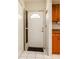 Welcoming entryway featuring a storm door and tile flooring at 5053 Live Oak Cir, Bradenton, FL 34207