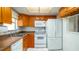 Functional kitchen featuring white appliances and lots of counter space at 5053 Live Oak Cir, Bradenton, FL 34207