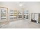 Bright bedroom with multiple windows and a white ceiling fan, open to customization at 516 71St St, Holmes Beach, FL 34217