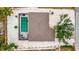 Aerial view of the home featuring a screened-in pool and outdoor living area at 5307 1St Avenue Nw Dr, Bradenton, FL 34209