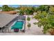 Aerial view of the screened pool area with tropical landscaping offering a private backyard oasis at 5307 1St Avenue Nw Dr, Bradenton, FL 34209