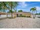 Charming single-story home featuring a well-maintained yard with a two-car garage at 5307 1St Avenue Nw Dr, Bradenton, FL 34209