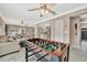 Bright room with foosball table and comfortable seating area; perfect for game nights and gatherings at 5307 1St Avenue Nw Dr, Bradenton, FL 34209