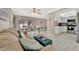 Cozy living room open to the kitchen with sliding doors to the screened lanai at 5307 1St Avenue Nw Dr, Bradenton, FL 34209
