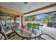 Enjoy this relaxing covered patio with a screened-in pool, perfect for entertaining and outdoor dining at 5307 1St Avenue Nw Dr, Bradenton, FL 34209