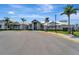 Exterior view of a community clubhouse with a modern design and well-maintained landscaping at 5406 Coral Reef Way, Lakewood Ranch, FL 34211