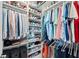 Spacious closet with multiple shelves and hanging rods, providing ample storage space at 5406 Coral Reef Way, Lakewood Ranch, FL 34211