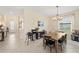 An open dining space is brightened by natural light and offers tile floors at 5406 Coral Reef Way, Lakewood Ranch, FL 34211