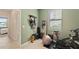 Exercise room featuring an elliptical, closet, storage, and weights at 5406 Coral Reef Way, Lakewood Ranch, FL 34211