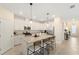 Bright kitchen with a large island, granite countertops, and stainless-steel appliances at 5406 Coral Reef Way, Lakewood Ranch, FL 34211