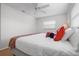 Bright bedroom with natural light, a ceiling fan, and comfortable pillows at 5523 Scotia Pl, Sarasota, FL 34231