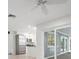 Modern kitchen featuring stainless steel appliances, white cabinets and an open floor plan at 5523 Scotia Pl, Sarasota, FL 34231