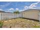Fenced backyard featuring stepping stones and ample yard space at 5532 River Sound Ter, Bradenton, FL 34208
