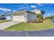 Spacious two-car garage with driveway and well-maintained landscaping at 5532 River Sound Ter, Bradenton, FL 34208